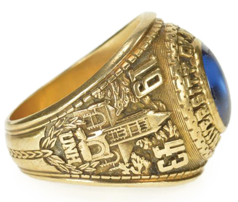 Side view of a 1943 class ring.