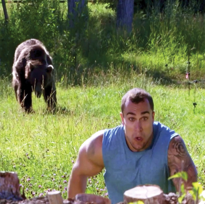 Mike Rosa “Man Vs Bear” running away from a bear