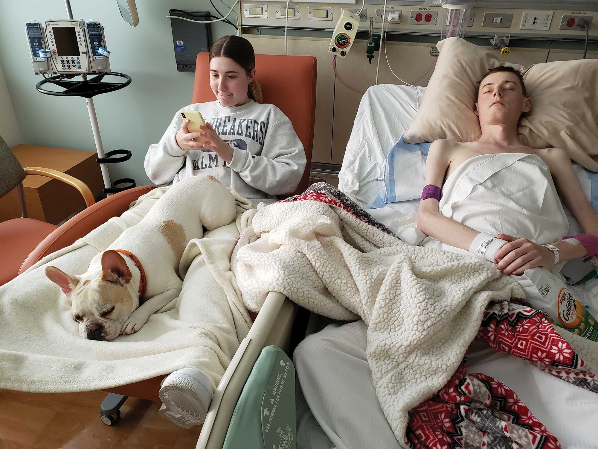 Andrew at NIH with his girlfriend, Hailey Kellogg ’18, and their French bulldog, Milo - courtesy photo