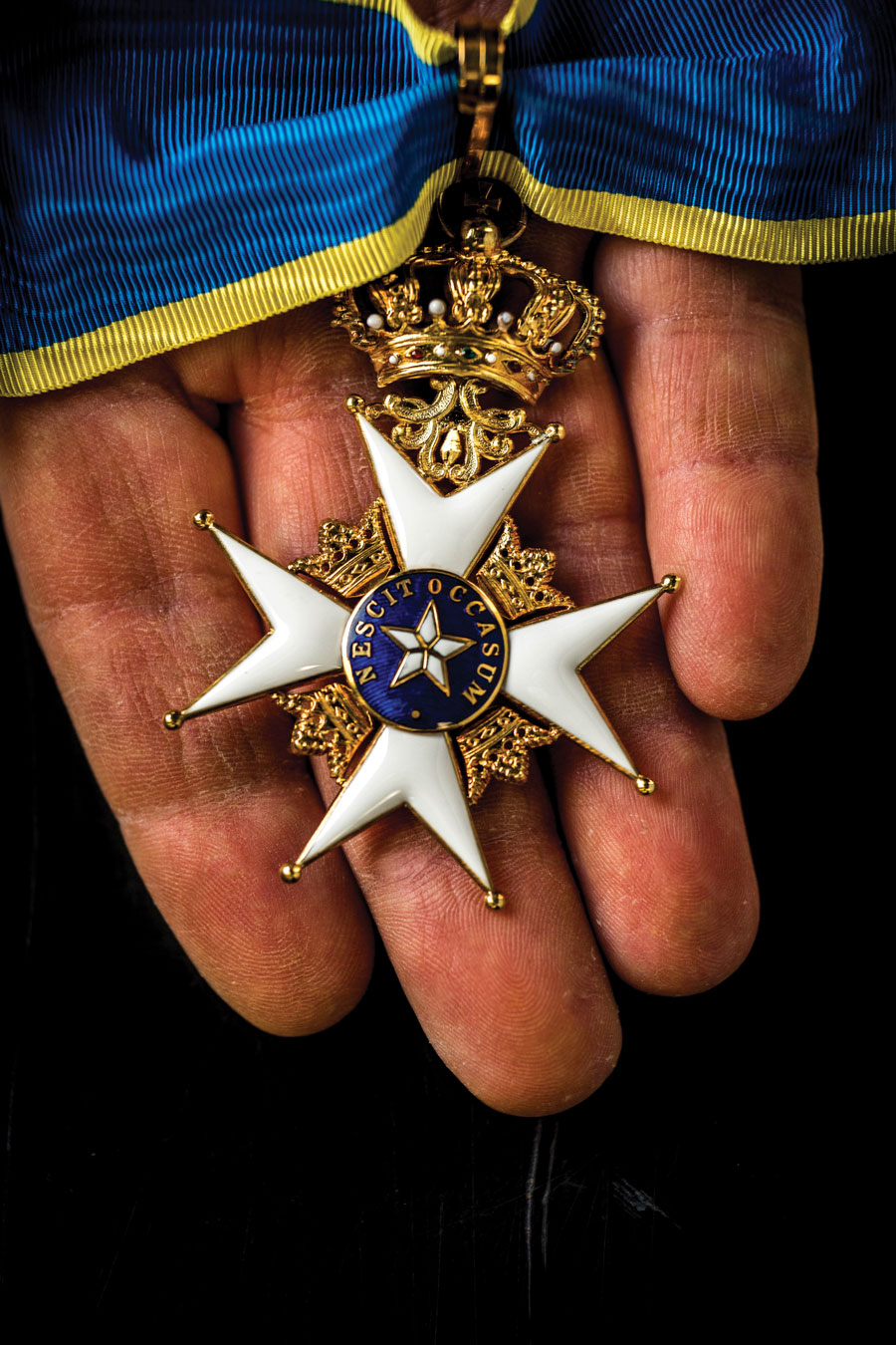 Bradley Olson ’94JD chivalric rank of Commander medal