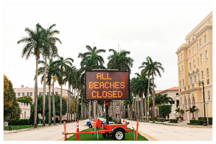 all beaches closed road sign at Royal Palm Way