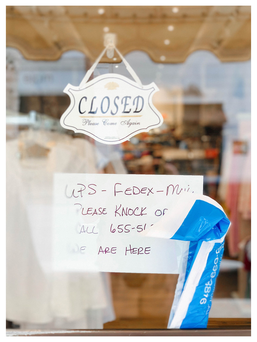 Closed, please come again sign on store door