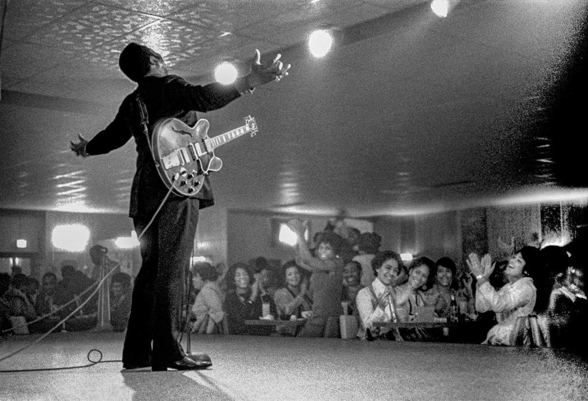 B.B. King on stage posing