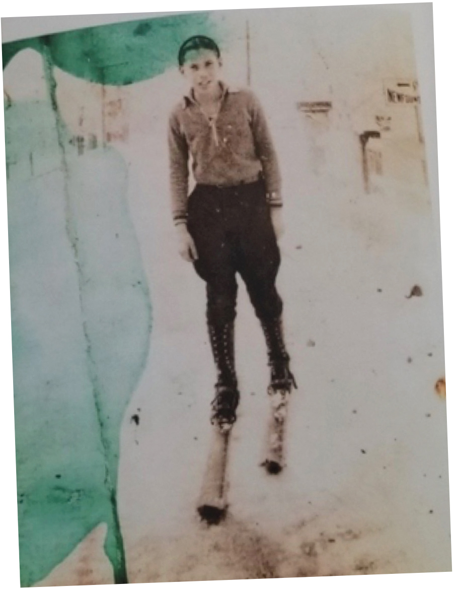 an old photo of a young Don Lamson ’48 on his homemade skis