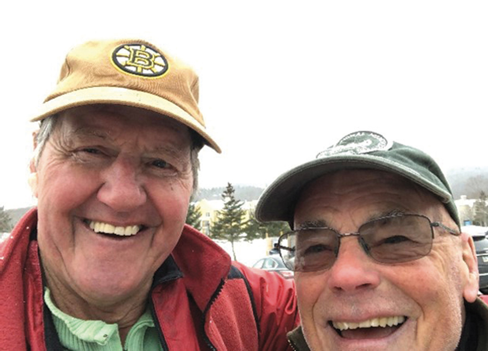 Joe Bartlett ’68 and Mike Farrell ’68 take a selfie together