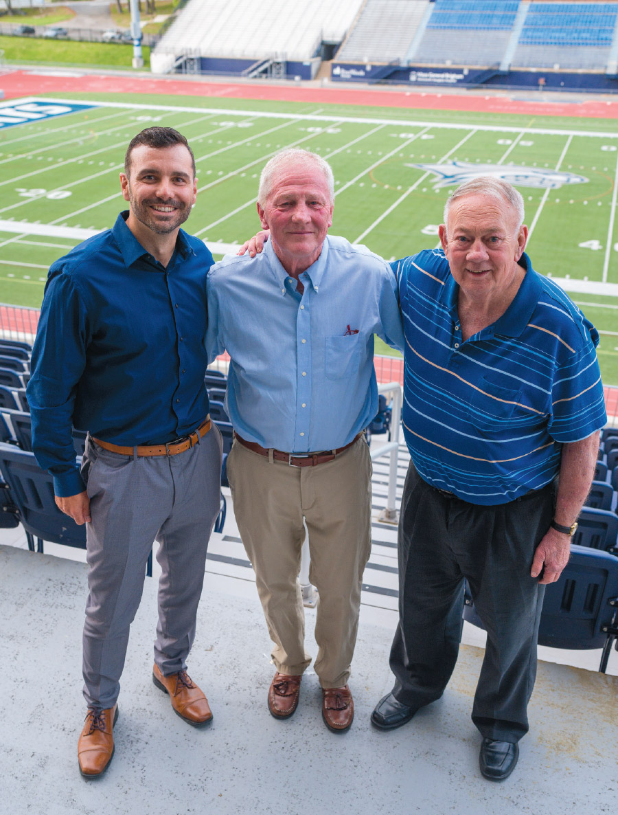 Three eras of UNH football: from left, Rick Santos ’08, Sean McDonnell ’78 and Bill Bowes