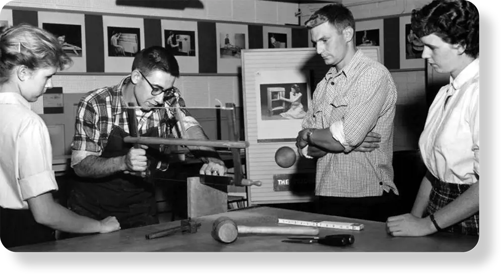 Valenza, second from left, with students in his Hewitt Hall woodshop, 1962. File Photo.