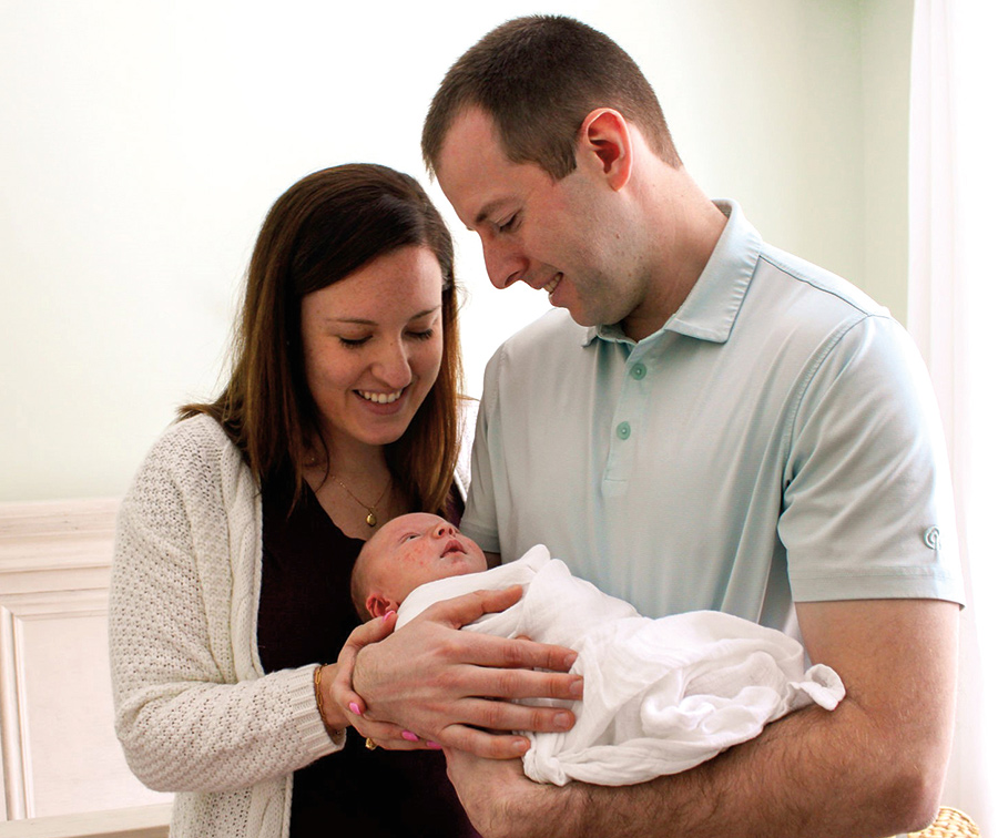Sarah St. Pierre and Brian Patinskas with their baby