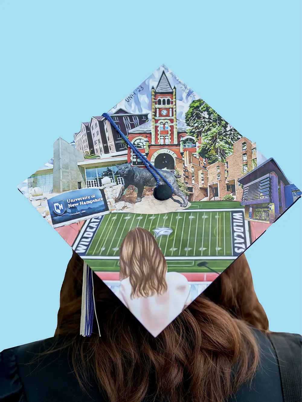 Back of students head with decorated commencement cap