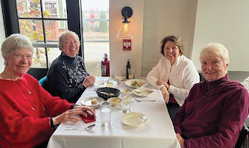 4 older ladies sitting at a table for lunch