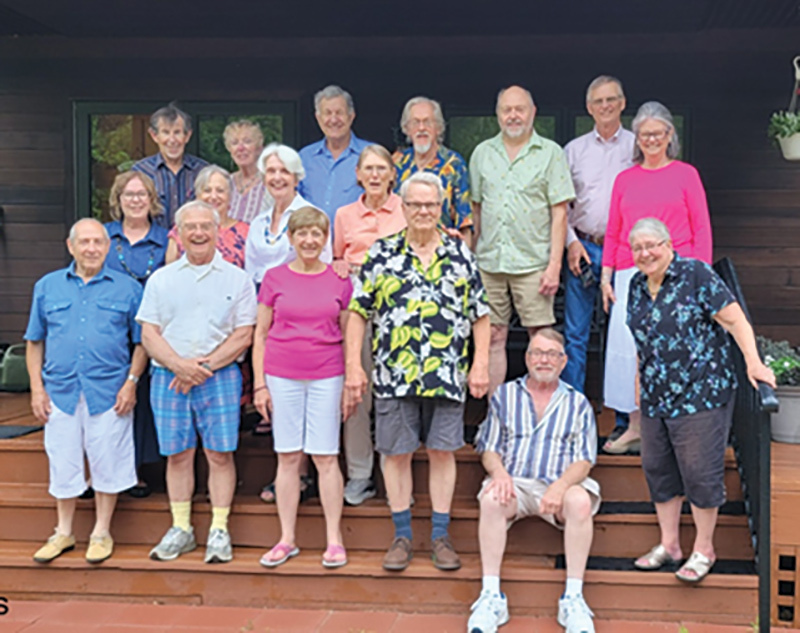 Group of older people posing for a group picture