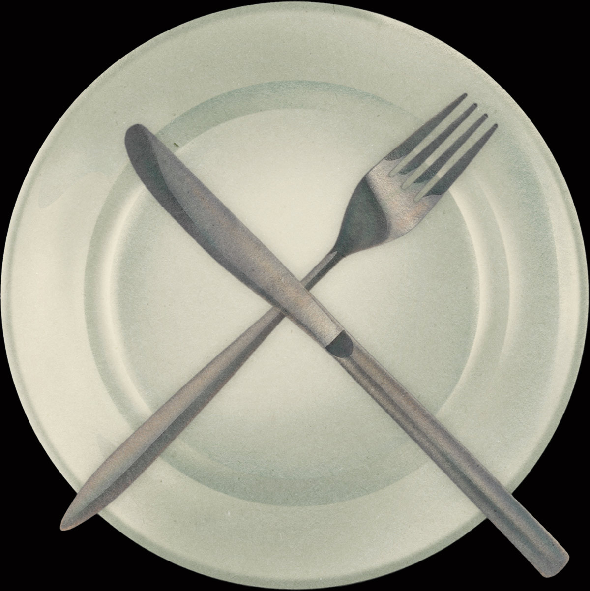 plate with fork and knife making an X shape on top