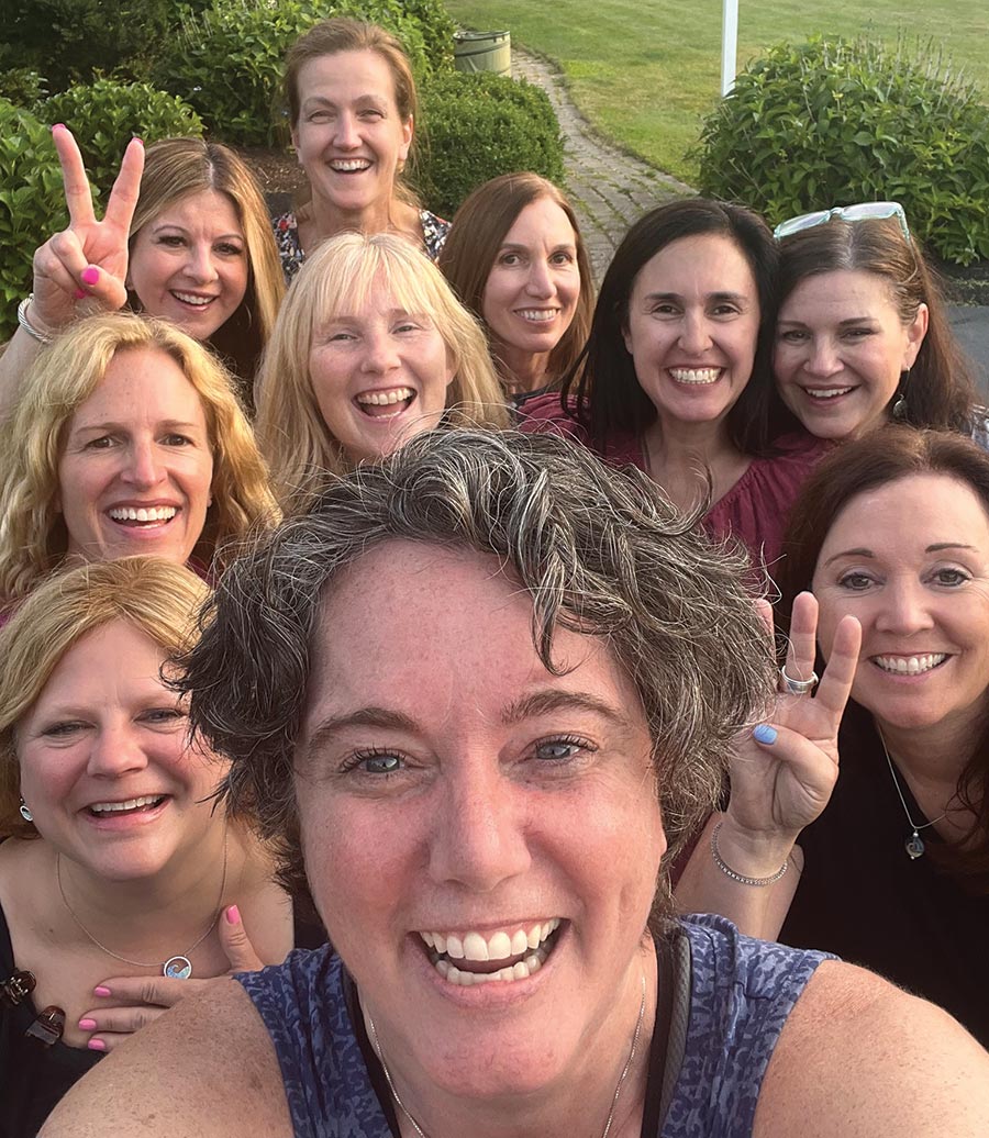 Close-up portrait selfie photograph of several 1992 classmates from Christensen Hall floor 4B coming together for an incredible reunion during Summer 2022