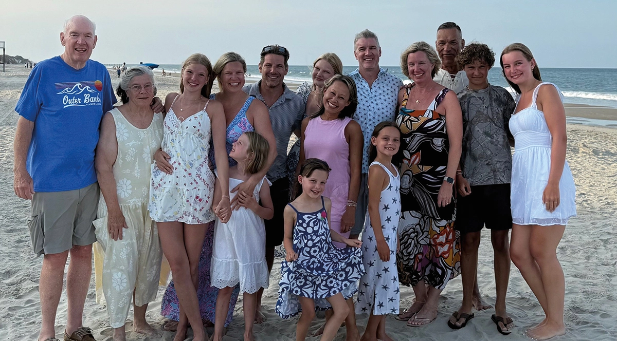 UNH Class of ’67’s Dick Knight’s family had another “Family Fest” including our family of three children Lindsay ’99, Thacer ’02 and Gretchen ’05 with spouses and seven grandkids; Here everyone is smiling and posing for a group picture at a beach of some kind