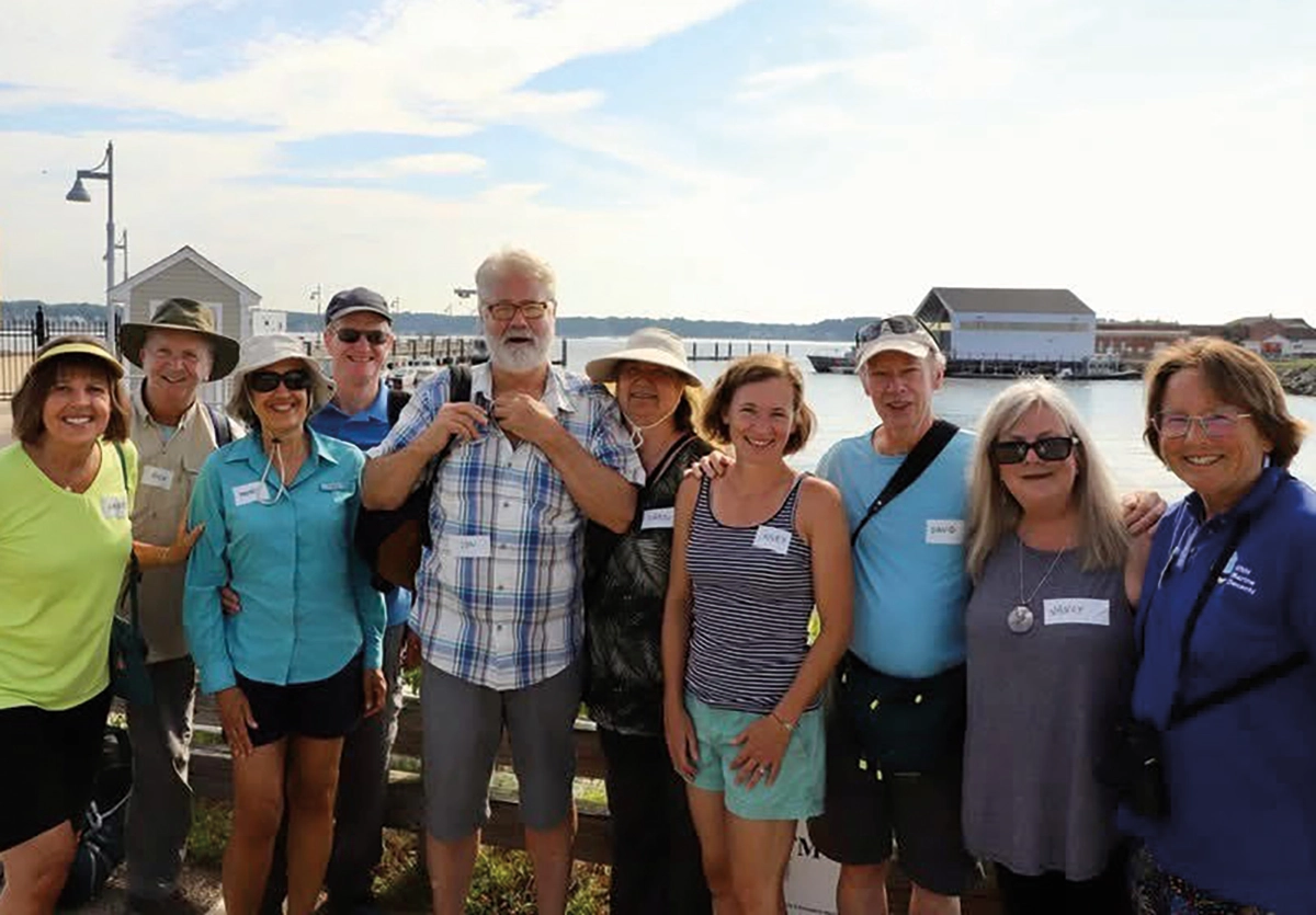 UNH graduates enjoyed a wonderful day last July on Appledore Island with docent Karen Shields ’76; Pictured from left to right: Karen Sedler Stevenson, ’77, Rick Stevenson ’74, Nancy Goodwin Berry ’76, Rob Berry ’75, John Iber ’76, Carol Jones Iber ’76, Kiley Jorgensen Hemphill ’00, Dave Jorgensen ’76, Nancy Van Billiard Levasseur ’76, Karen Shields ’76
